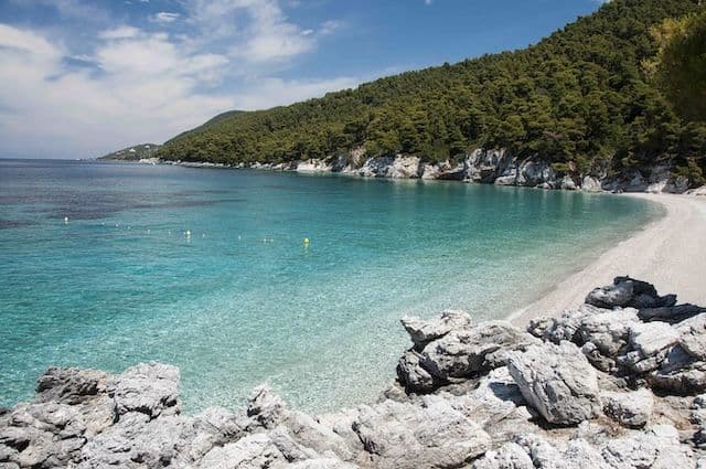panormous beach rocks crystal clear water greece
