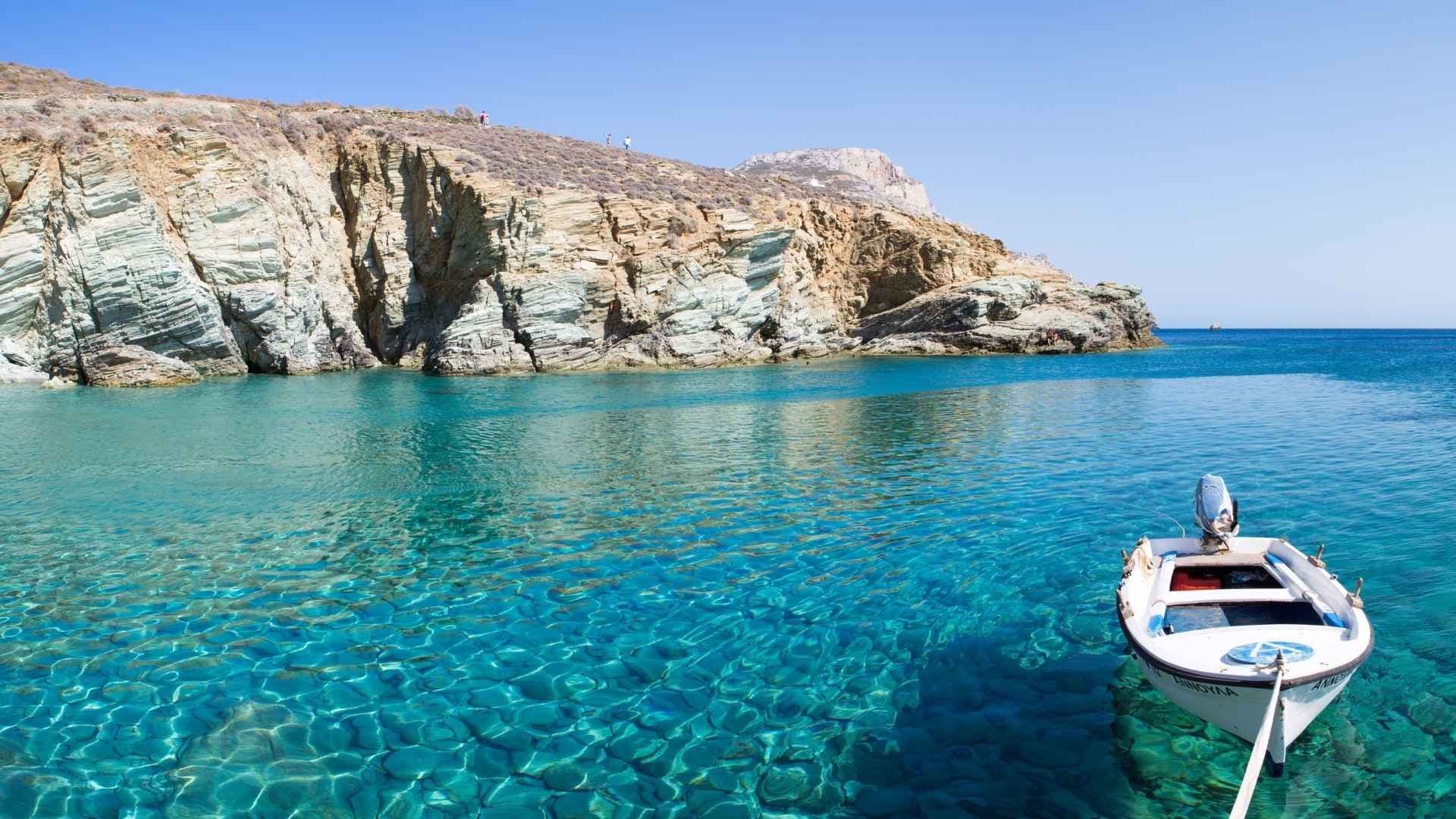 clear waters boat moored mountain folegandros greece