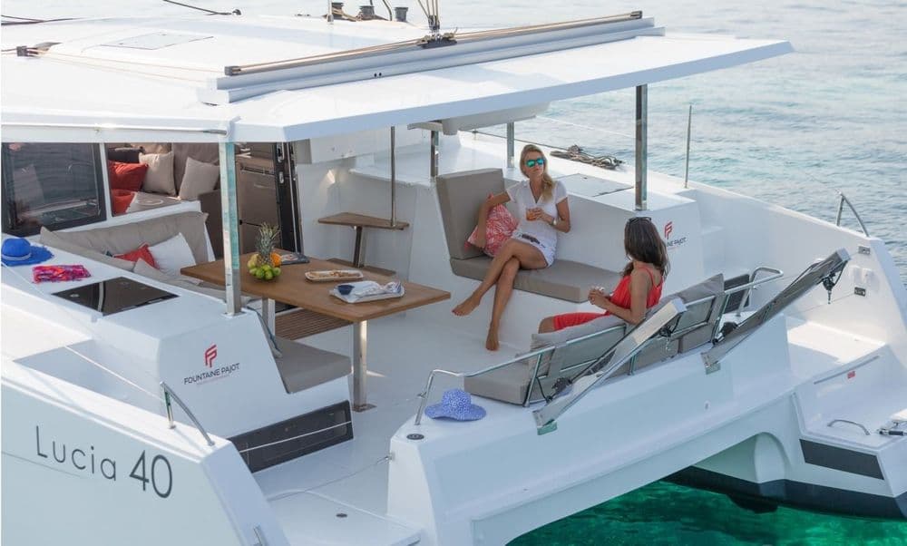 lucia 40 sea energy IV people sitting back boat