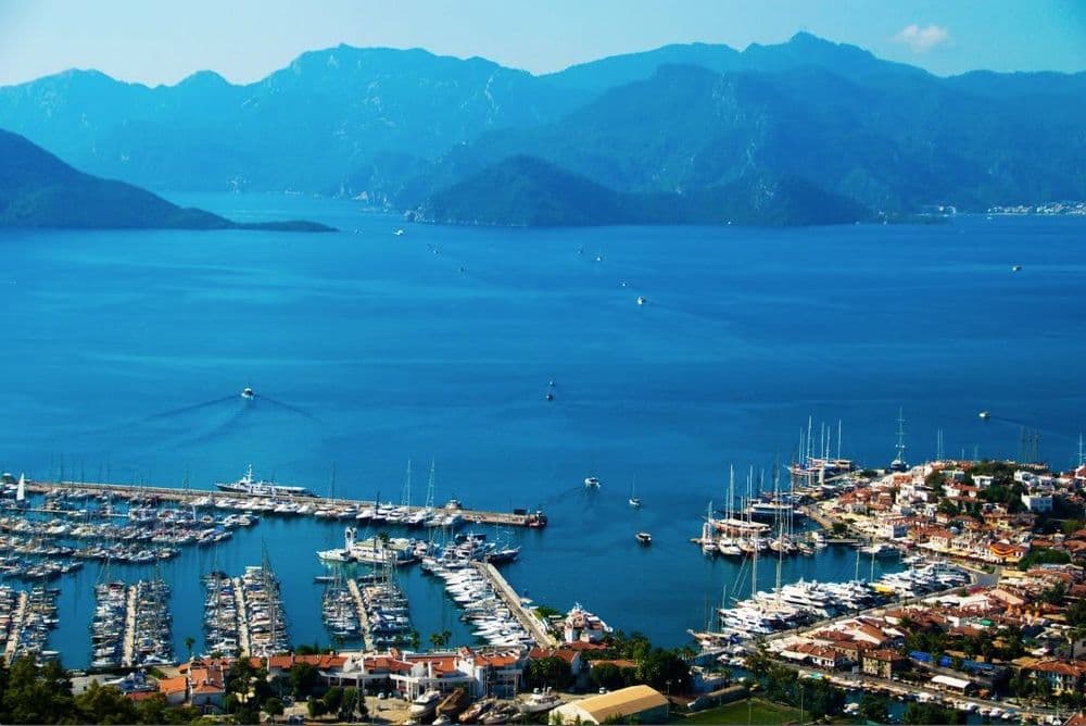 marmaris harbour and mountains over the water