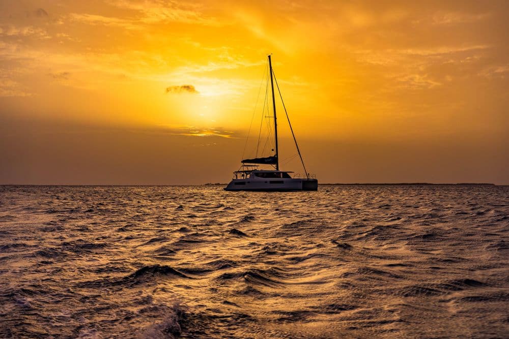 belize catamaran at sunset