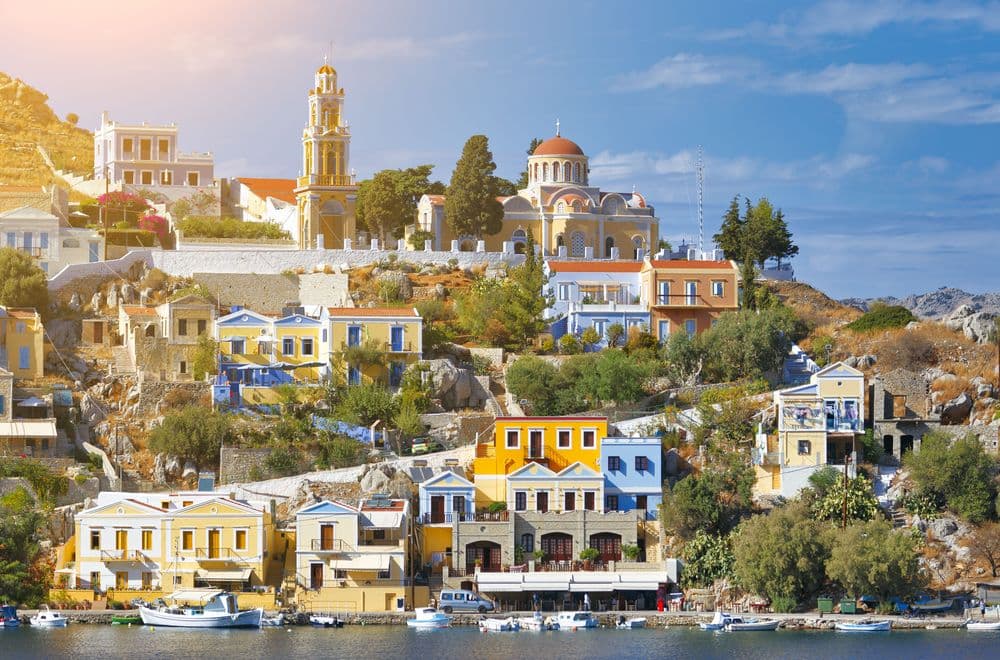 ano symi town houses overlooking water in greece