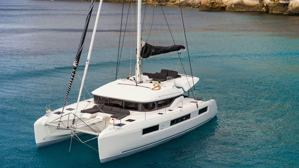 lagoon 50 bareboat catamaran full shot in a bay